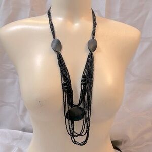 Black beaded boho multi strand long necklace in excellent condition.